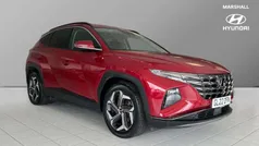 Sunset red Used 2022 Hyundai Tucson Premium SUV | £23,515 (Fair price)