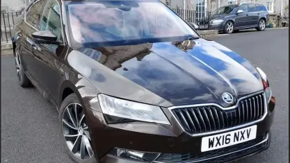 Używany Skoda Superb 150 KM (110 kW) 2016 Brązowy Hatchback