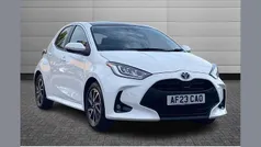 Pure white Used 2023 Toyota Yaris Hybrid Design Hatchback | £16,895 (Fair price)