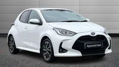 Pure white Used 2023 Toyota Yaris Hybrid Design Hatchback | £17,495 (Fair price)