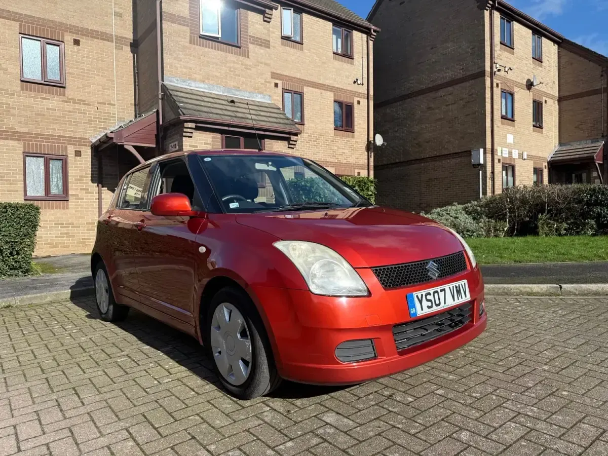 Używany Suzuki Swift GL 92 KM (67 kW) 2007 Pomarańczowy Hatchback