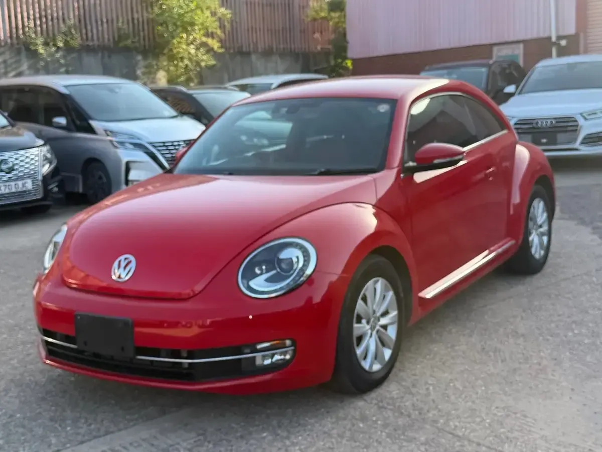 Used VW Beetle 105 HP (77 kW) 2015 Red Hatchback