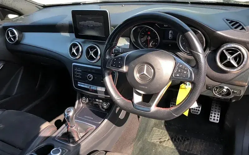 Used Mercedes CLA180 AMG line 122 HP (89 kW) 2019 Black Sedan