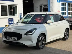 Pure white pearl metallic Used 2024 Suzuki Swift Hatchback | £17,495 (Expensive)
