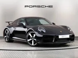 Jet black metallic New 2024 Porsche 911 Carrera | £112,000 (Expensive)