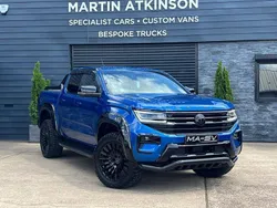 Bright blue New 2025 VW Amarok Black Edition Pickup | £53,950 (A bit pricey)