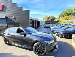Black Used 2021 BMW 330e M Sport Estate | £21,991 (Fair price)
