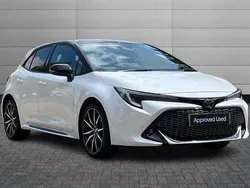 Pure white with black roof Used 2023 Toyota Corolla Sport Hatchback | £22,695 (A bit pricey)