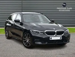 Black Used 2021 BMW 330e Sport Line Estate | £18,991 (Fair price)
