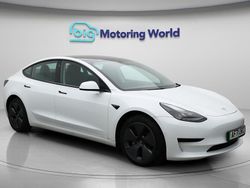 White Used 2021 Tesla Model 3 Standard Range Plus Sedan | £17,400 (A bit pricey)