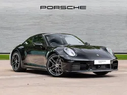 Jet black metallic New 2024 Porsche 911 Carrera | £119,500 (Fair price)
