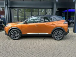 Orange Used 2022 Peugeot e-2008 Premium SUV | £15,999 (Fair price)