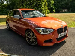 Orange Used 2014 BMW M135 Comfort Edition Hatchback | £11,333 (Fair price)