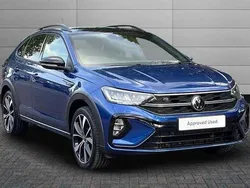 Reef blue with deep black pearl roof Used 2022 VW Taigo R-line SUV | £20,895 (Fair price)