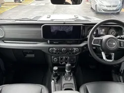Grey New 2025 Jeep Wrangler Sahara SUV | £53,093 (Fair price)