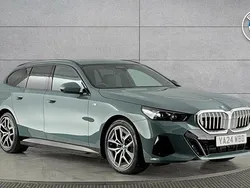 Green New 2024 BMW 530e M Sport Estate | £47,950 (Fair price)