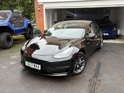 Black Used 2021 Tesla Model 3 Long Range AWD Sedan | £15,495 (A bit pricey)