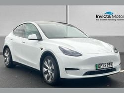 Solid white Used 2023 Tesla Model Y RWD SUV | £24,500 (Fair price)