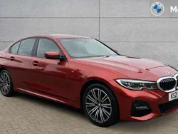 Sunset orange metallic Used 2021 BMW 330e M Sport Sedan | £22,109 (Fair price)