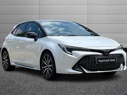 Pure white with black roof Used 2023 Toyota Corolla Sport Hatchback | £21,795 (Fair price)