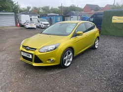 Yellow Used 2011 Ford Focus Titanium Hatchback | £2,495 (A bit pricey)
