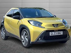 Brass gold with black roof Used 2023 Toyota Aygo Hatchback | £13,895 (Fair price)