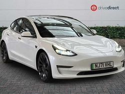 Multi coat pearl white Used 2021 Tesla Model 3 Performance Sedan | £21,330 (A bit pricey)