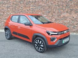 Metallic brick red New 2025 Dacia Spring Expression Hatchback | £12,198 (Fair price)