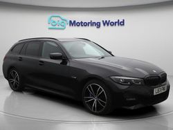 Black Used 2021 BMW 330e M Sport Estate | £20,700 (Fair price)