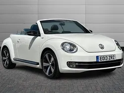 Pure white with black roof Used 2013 VW Beetle Edition Cabriolet | £11,795 (Fair price)