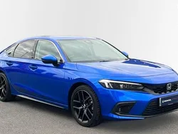 Premium plus paint crystal blue Used 2023 Honda Civic Advance Hatchback | £27,523 (Fair price)
