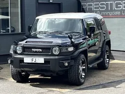 Black with white roof Used 2014 Toyota FJ Cruiser SUV | £29,950 (Expensive)