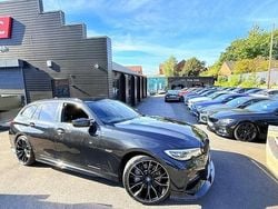 Black Used 2021 BMW 330e M Sport Estate | £20,991 (Fair price)