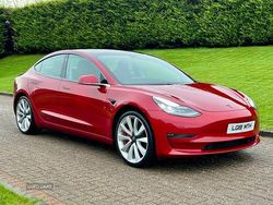 Red Used 2019 Tesla Model 3 Performance Sedan | £20,495 (A bit pricey)