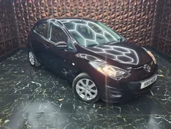 Maroon Used 2011 Mazda 2 Hatchback | £6,699 (A bit pricey)