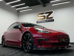Red Used 2019 Tesla Model 3 Performance Sedan | £19,995 (A bit pricey)