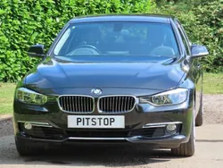 Black sapphire metallic Used 2013 BMW 328 Luxury Line Sedan | £9,700