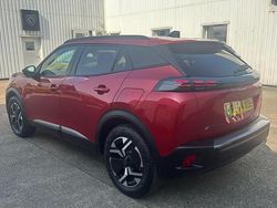 Red New 2025 Peugeot e-2008 Allure SUV | £18,835 (Fair price)