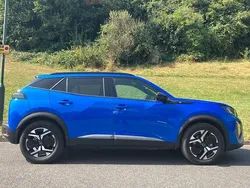 Blue New 2024 Peugeot e-2008 Allure SUV | £18,095 (Fair price)