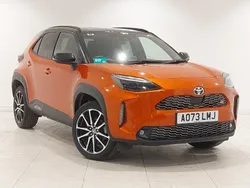 Orange/black Used 2023 Toyota Yaris Hybrid Sport Estate | £25,498 (A bit pricey)