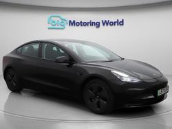 Black Used 2021 Tesla Model 3 Standard Range Plus Sedan | £18,000 (A bit pricey)