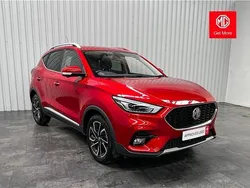 Tri coat dynamic red Used 2024 MG ZS Exclusive Sedan | £14,795 (Fair price)