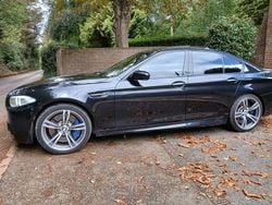Black sapphire metallic Used 2011 BMW M5 Sedan | £18,995