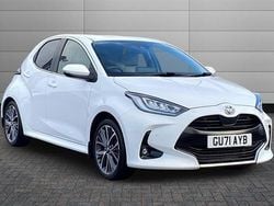 Pure white Used 2021 Toyota Yaris Hybrid Hatchback | £18,495 (A bit pricey)