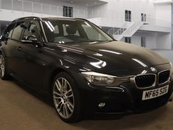 Black Used 2015 BMW 330 M Sport Estate | £14,000 (Fair price)