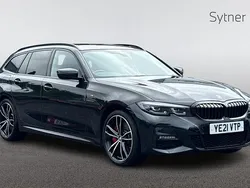 Black Used 2021 BMW 330e M Sport Estate | £24,000 (Fair price)