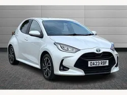 Pure white Used 2023 Toyota Yaris Hybrid Design Hatchback | £17,495 (Fair price)