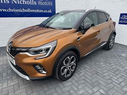 Orange/black Used 2021 Renault Captur Version S SUV | £13,995 (A bit pricey)