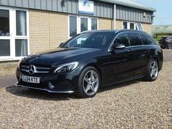 Black Used 2014 Mercedes C250 AMG line Estate | £12,995 (A bit pricey)