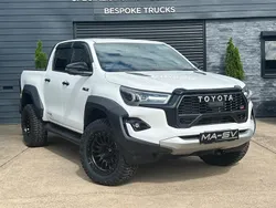 Pure white New 2025 Toyota HiLux Sport Pickup | £45,995 (Expensive)